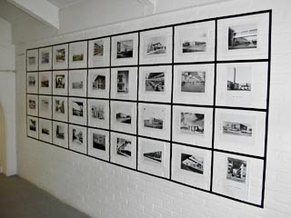 Black & white pictures shown at the exhibition 'De Wolfsdonken, naoorlogse industri&euml;le architectuur